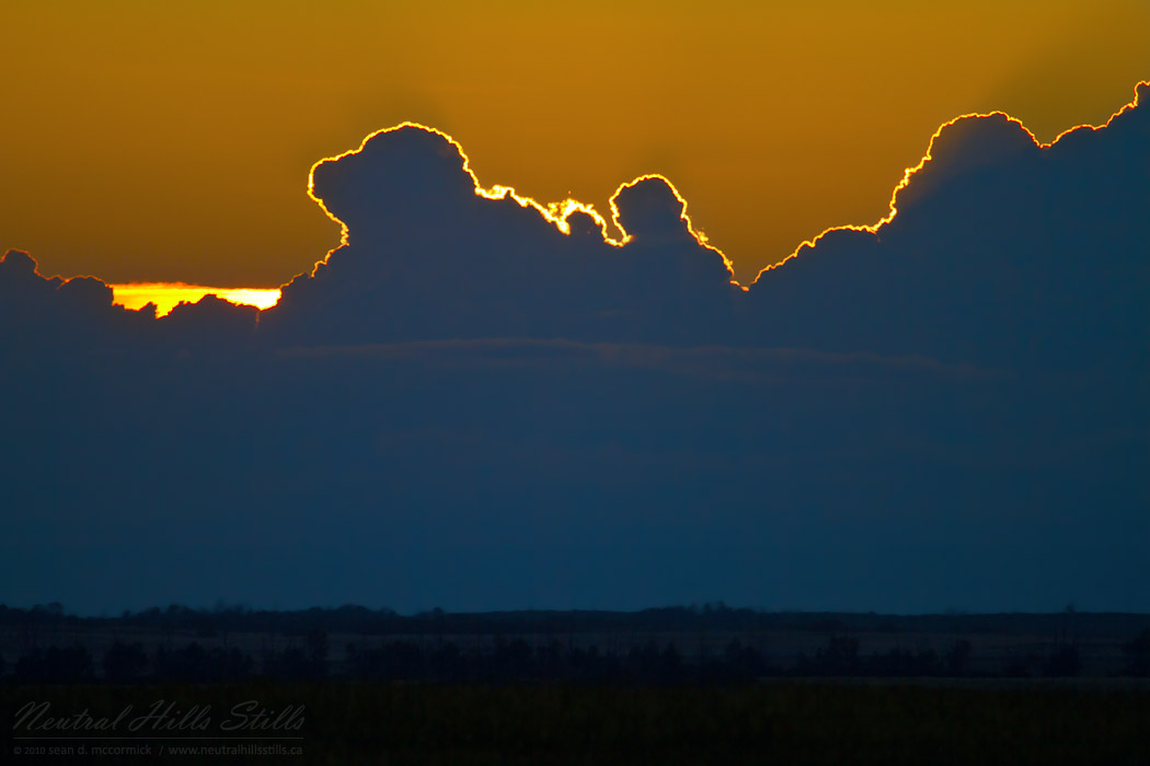 Sunset, Aug 09, 2010: Dropping behind a storm front