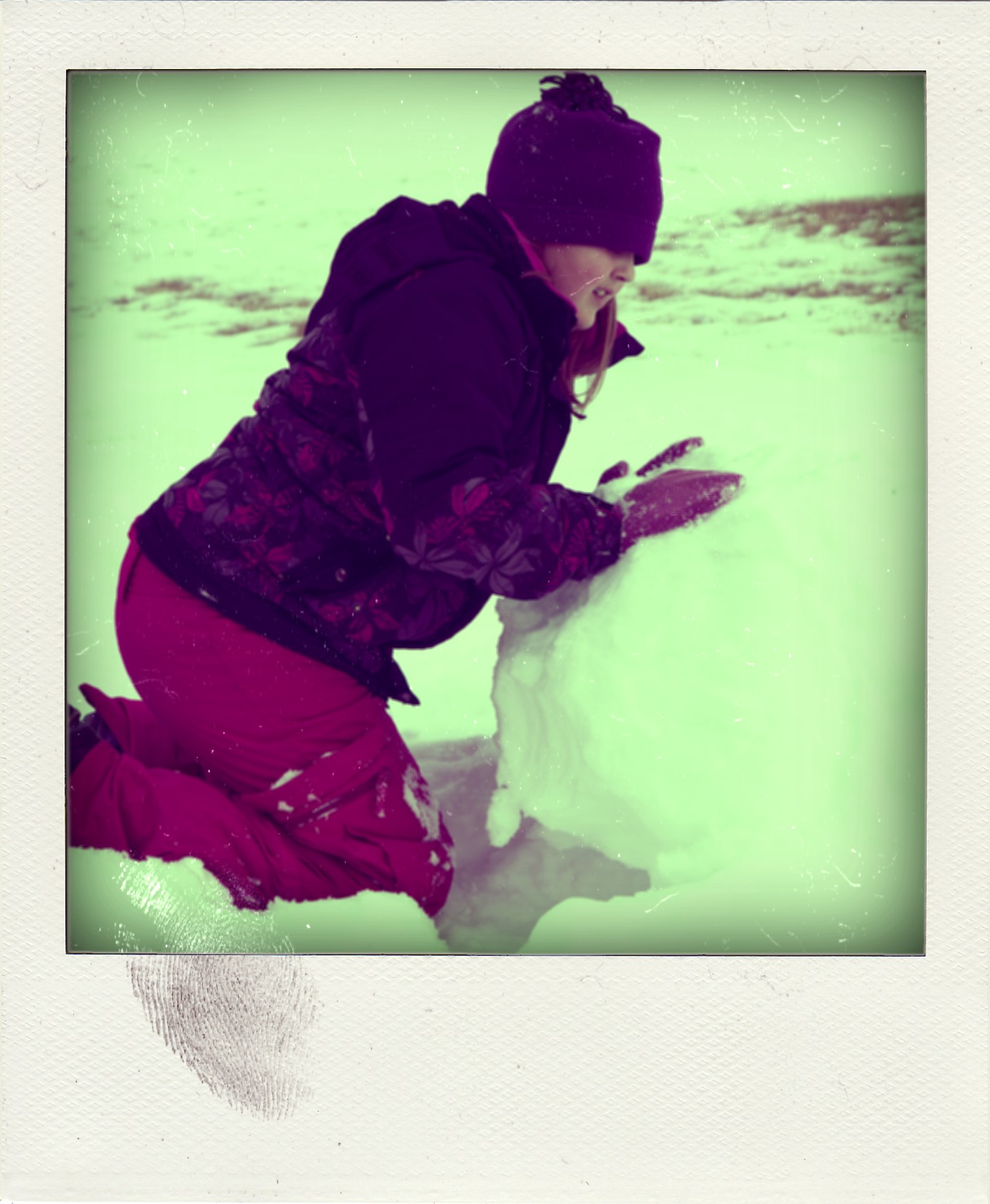 Ash rolling out base of snowman