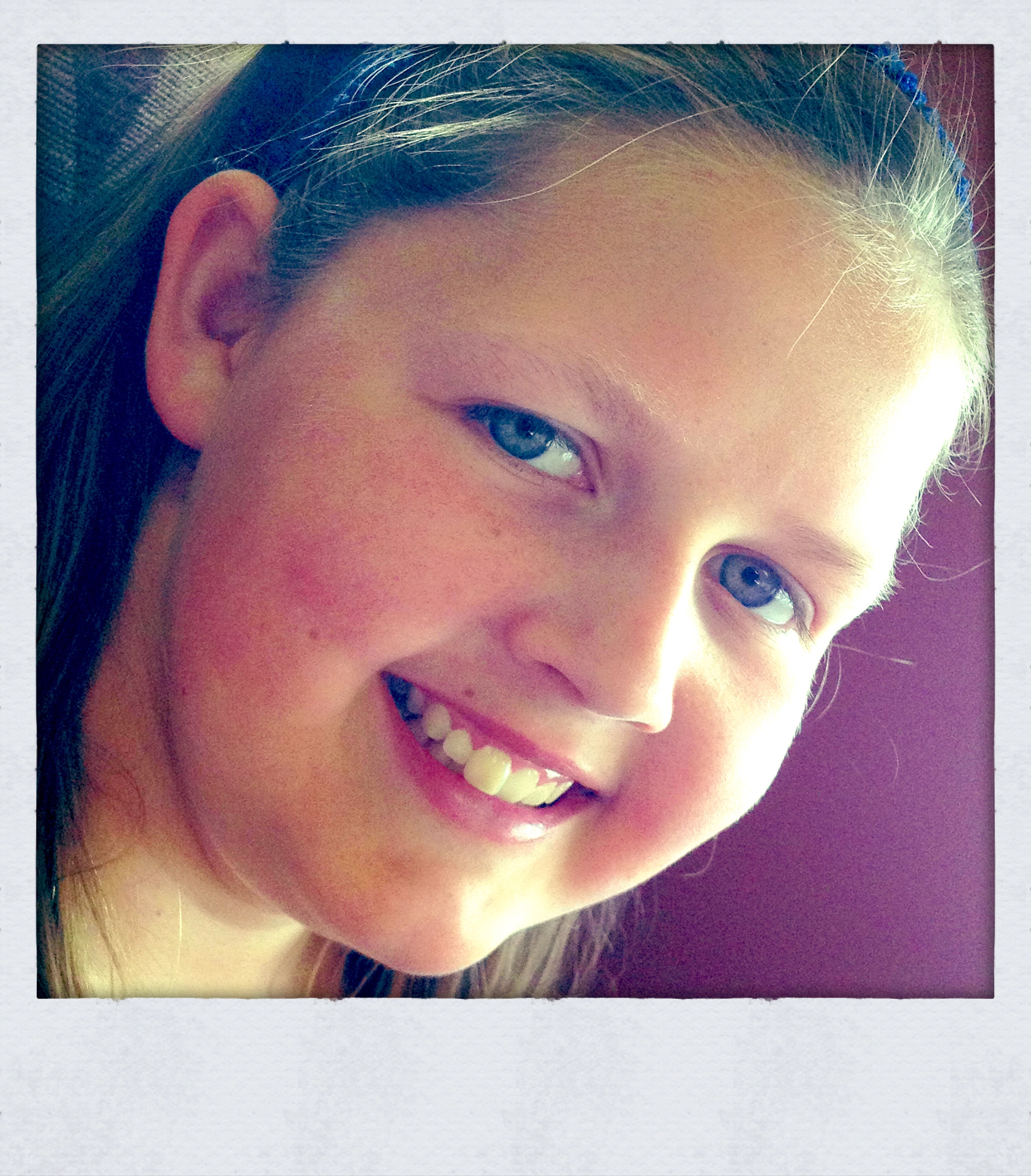 The smile means she's up to something