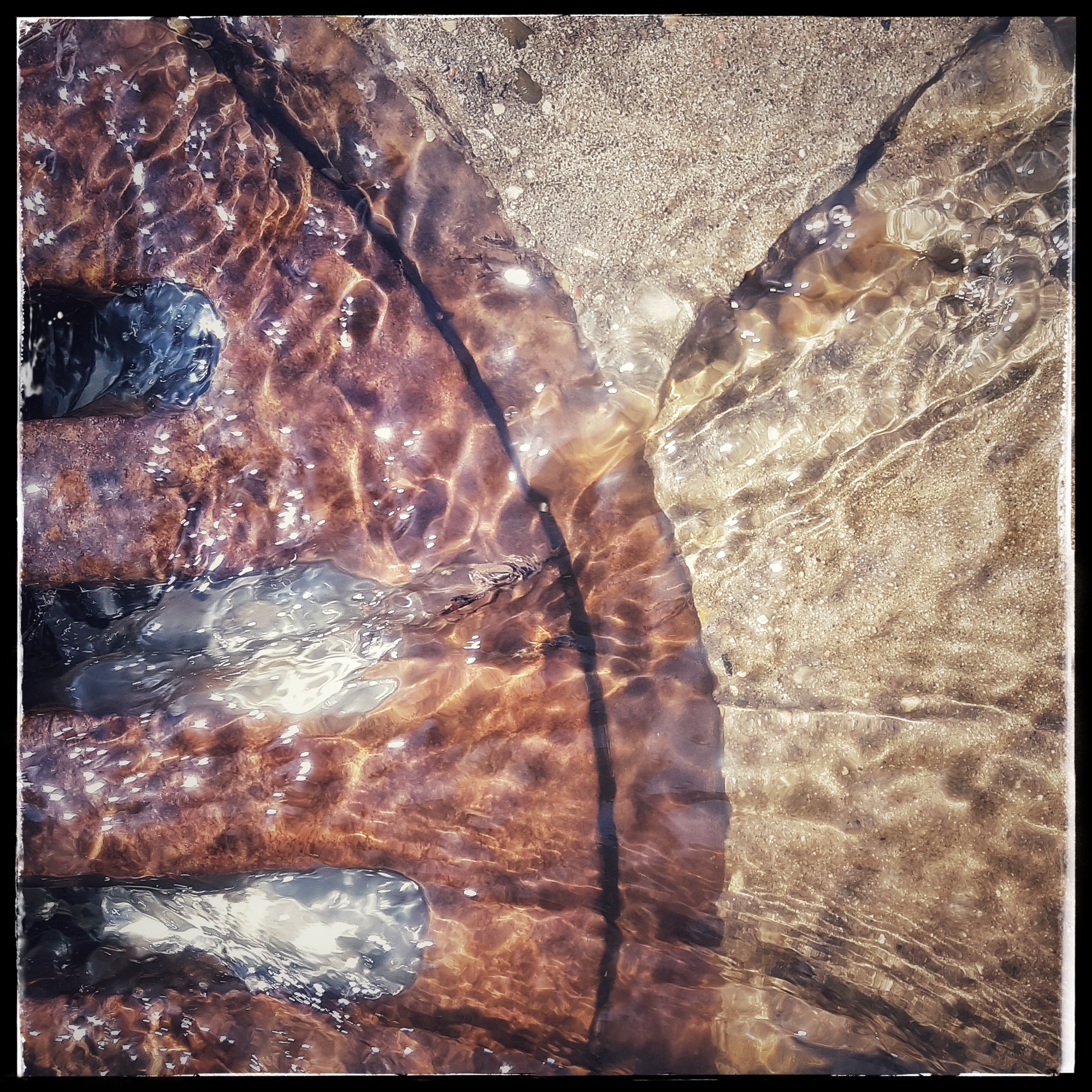 Spring melt running into storm drain
