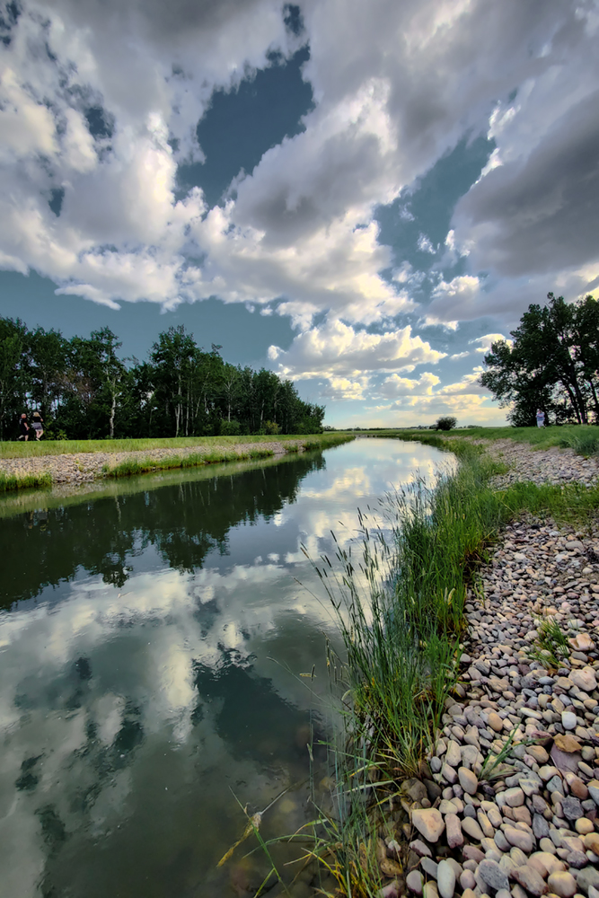 Clouds Reflected in Irrigation Canal Northwest of Strathmore, Alberta, June 16, 2021, 1 of 2
