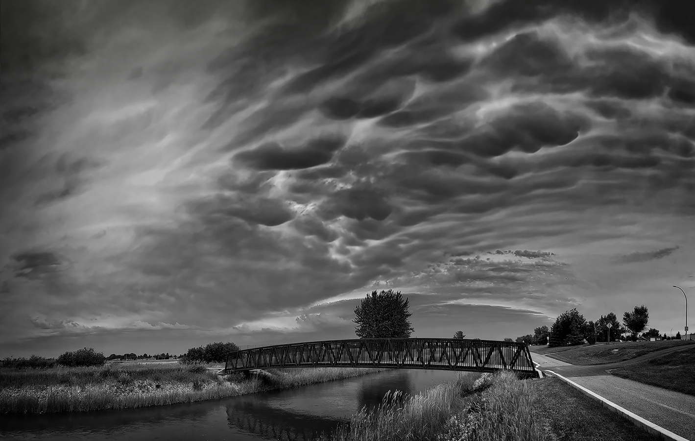 Tom Sadler Bridge and Approaching Storm, Strathmore, AB, 2022-07-29 B&W