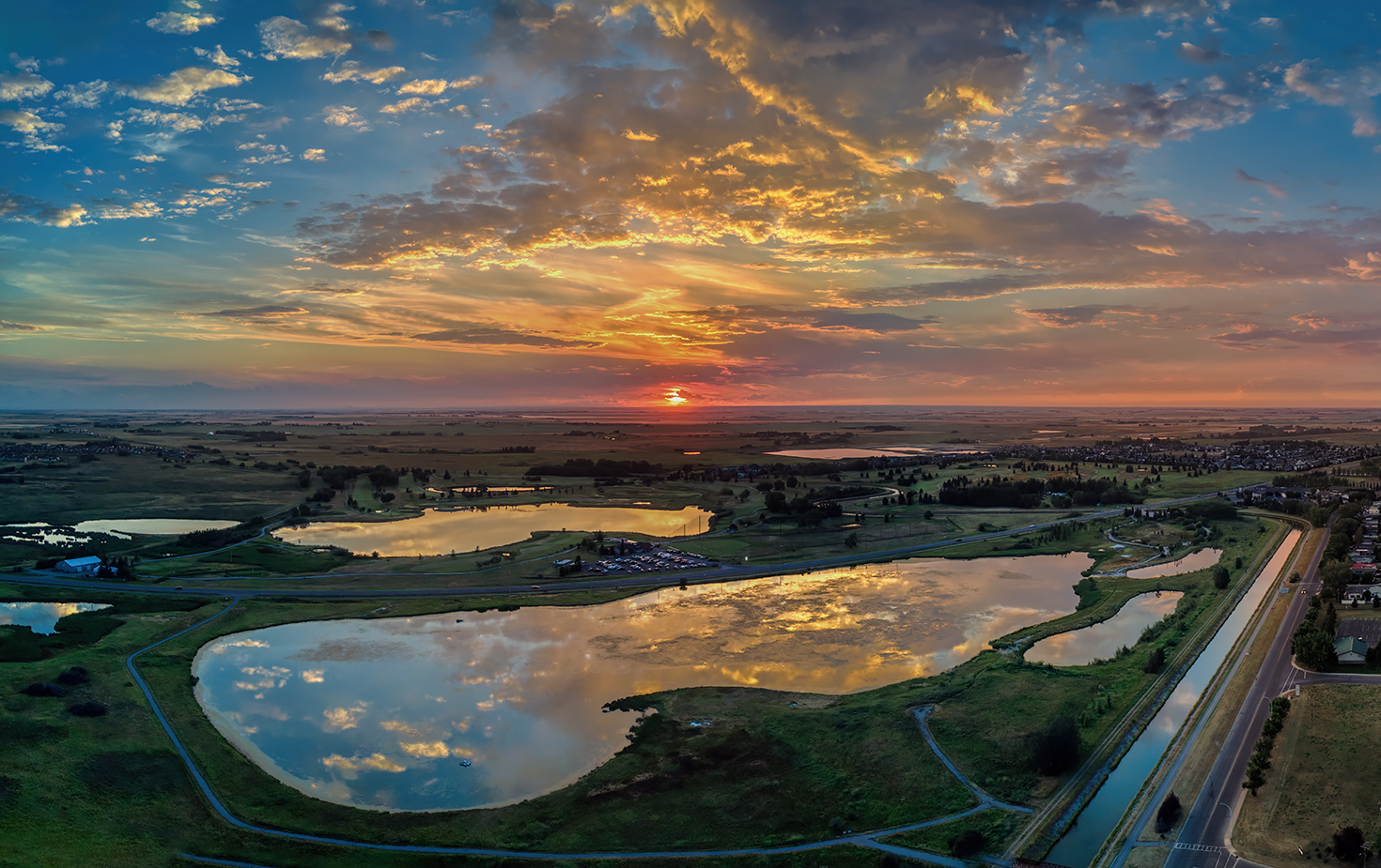 Sun Kissing the Horizon, Elevated View, North Pond, Gray Park, Strathmore, AB, 2022-08-15