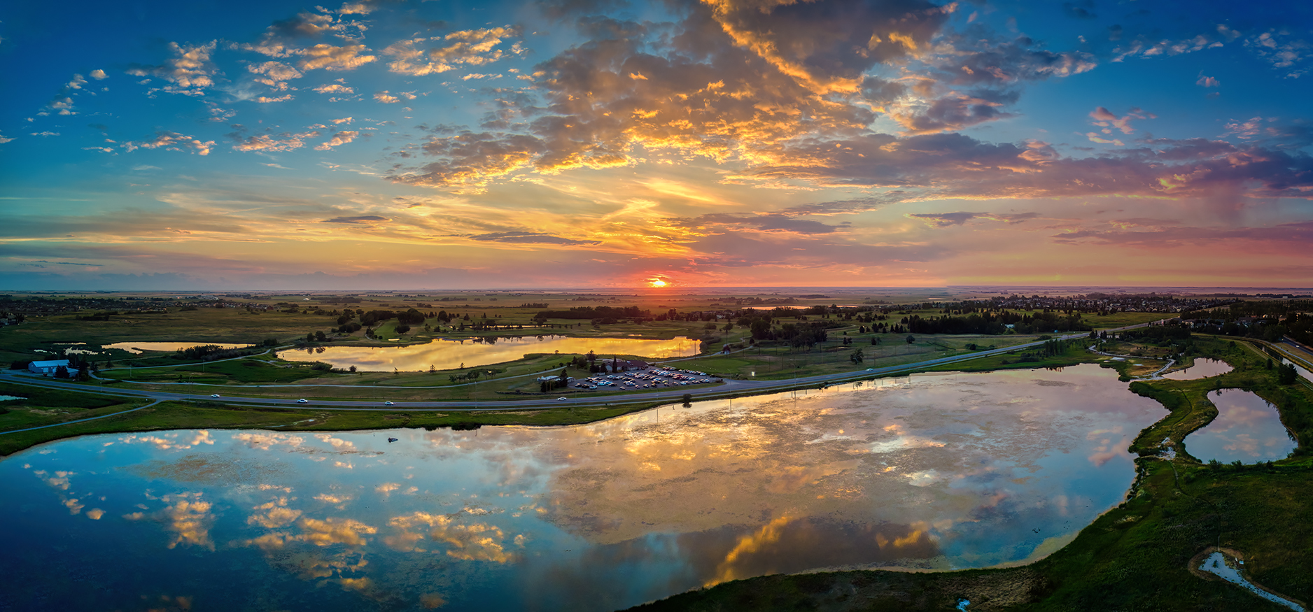 Sun Kissing the Horizon, Enlarged View, North Pond, Gray Park, Strathmore, AB, 2022-08-15