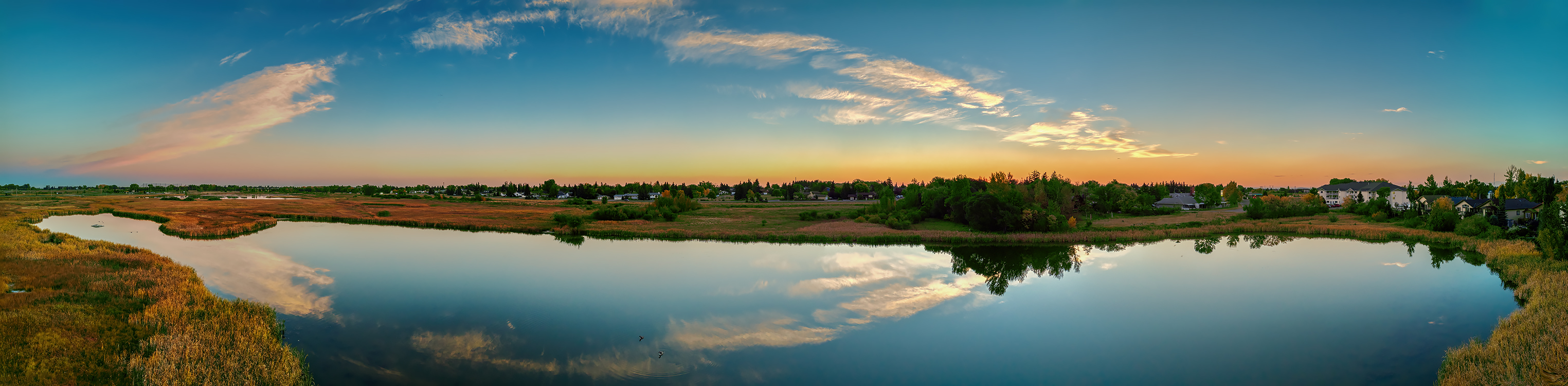 Sunrise over the lower pond, Gray Park, Strathmore, Alberta, 2022-09-28