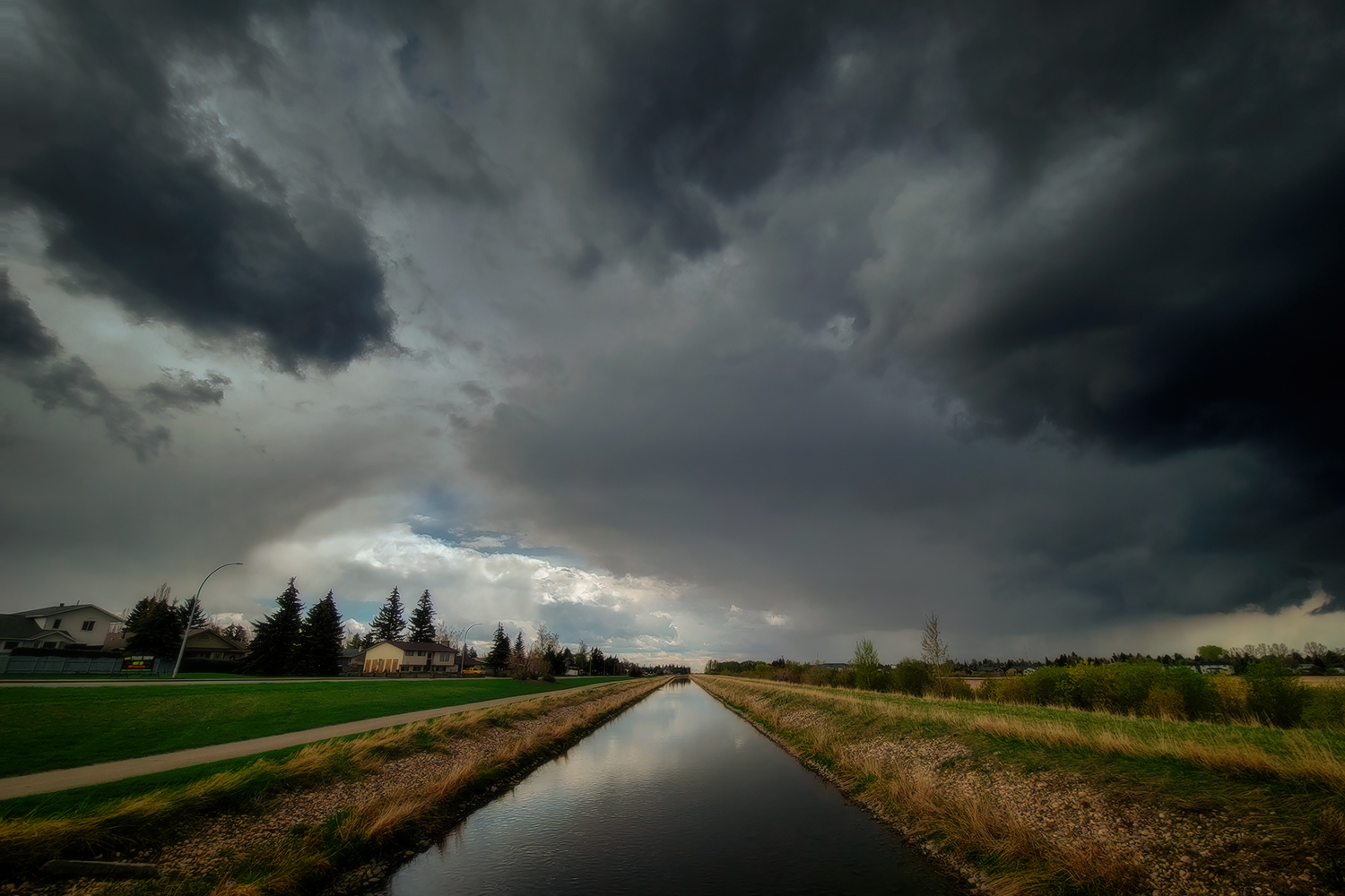 Water Above & Water Below, Irrigation Canal Along Thomas Drive, Strathmore, Alberta. 2023-05-08