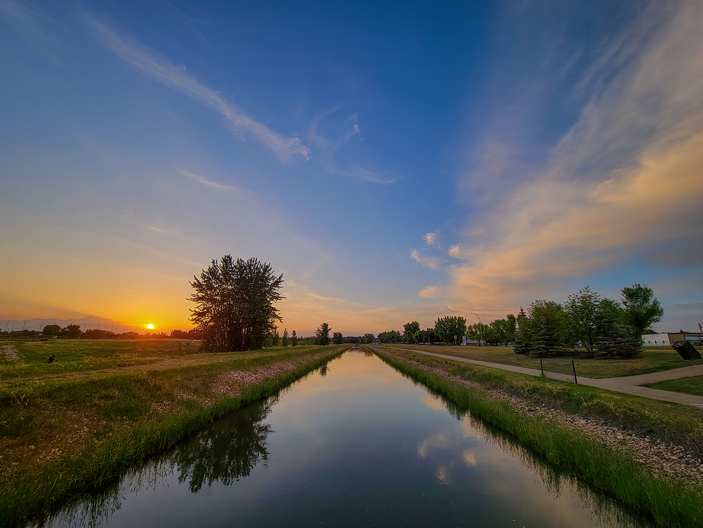Sun Tipping the Horizon at the West Irrigation Canal, Strathmore, Alberta, 2023-05-31