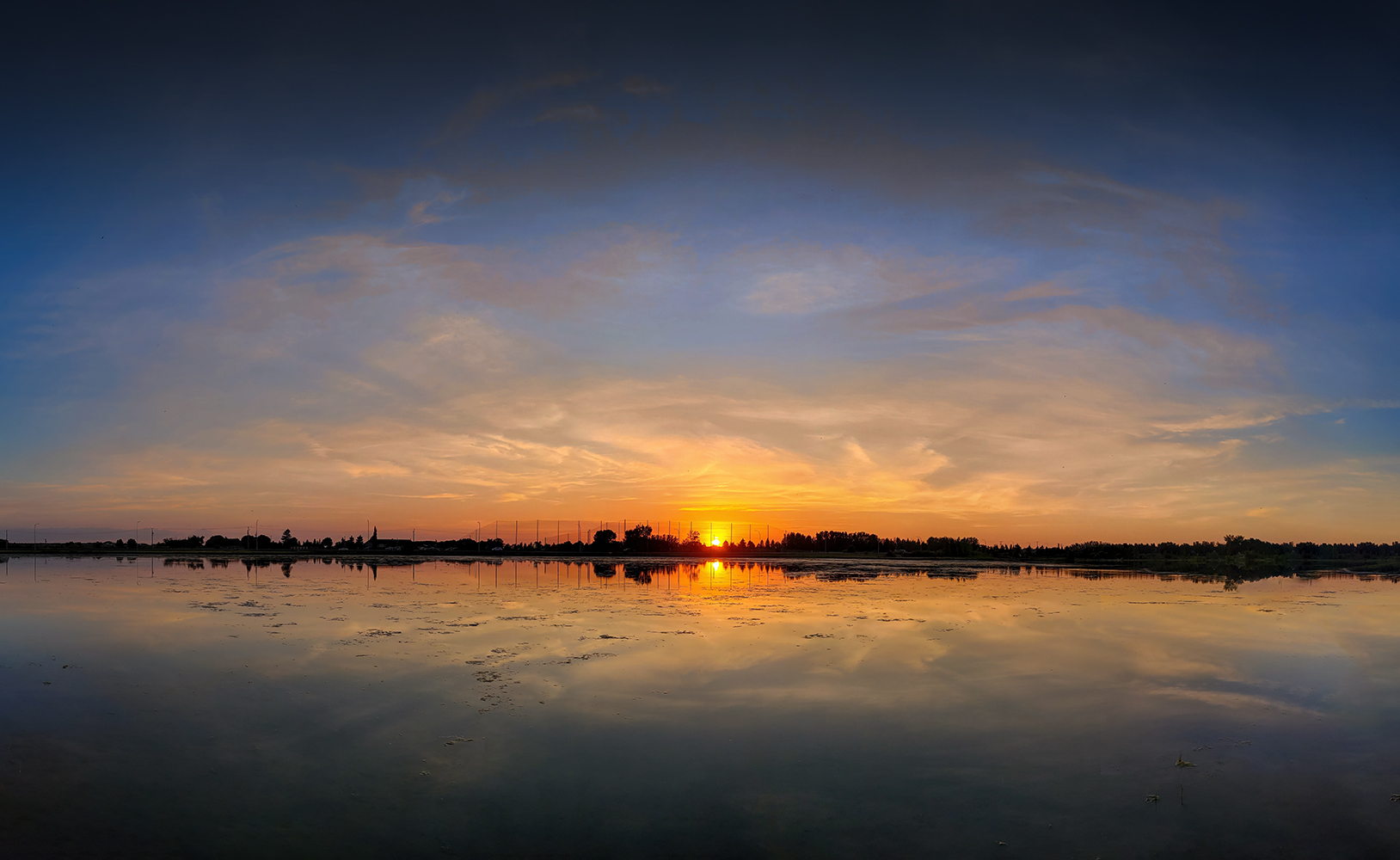 Sun Tipping the Horizon, Gray Pond, Strathmore, Alberta. 2023-06-07