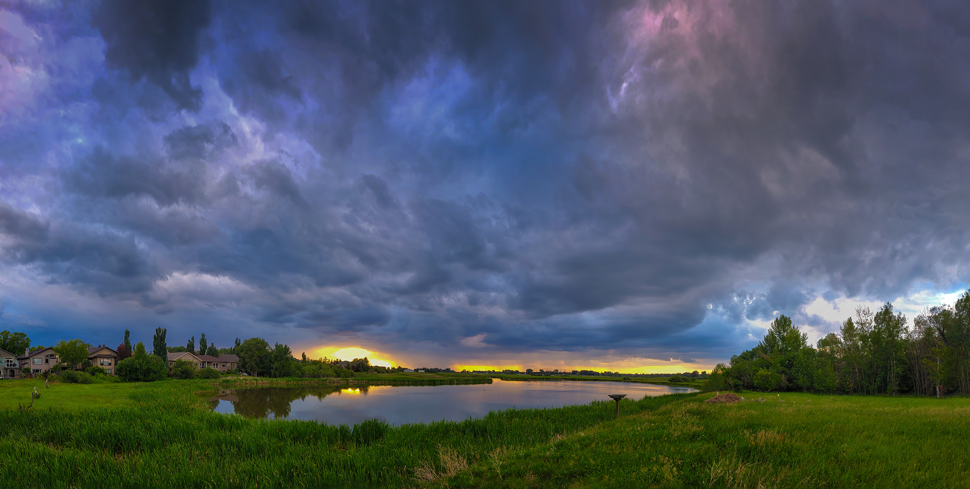 75% chance of rain, Lower Pond, Gray Park, Strathmore, Alberta. 2023-07-04