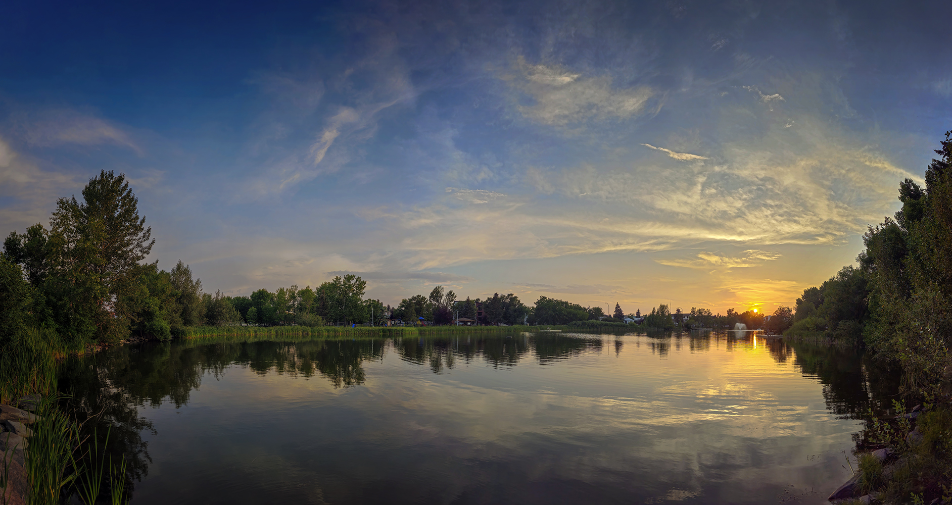 Setting Sun Tipping the Municipal Building Kinsmen Lake, Strathmore, Alberta. 2023-07-20