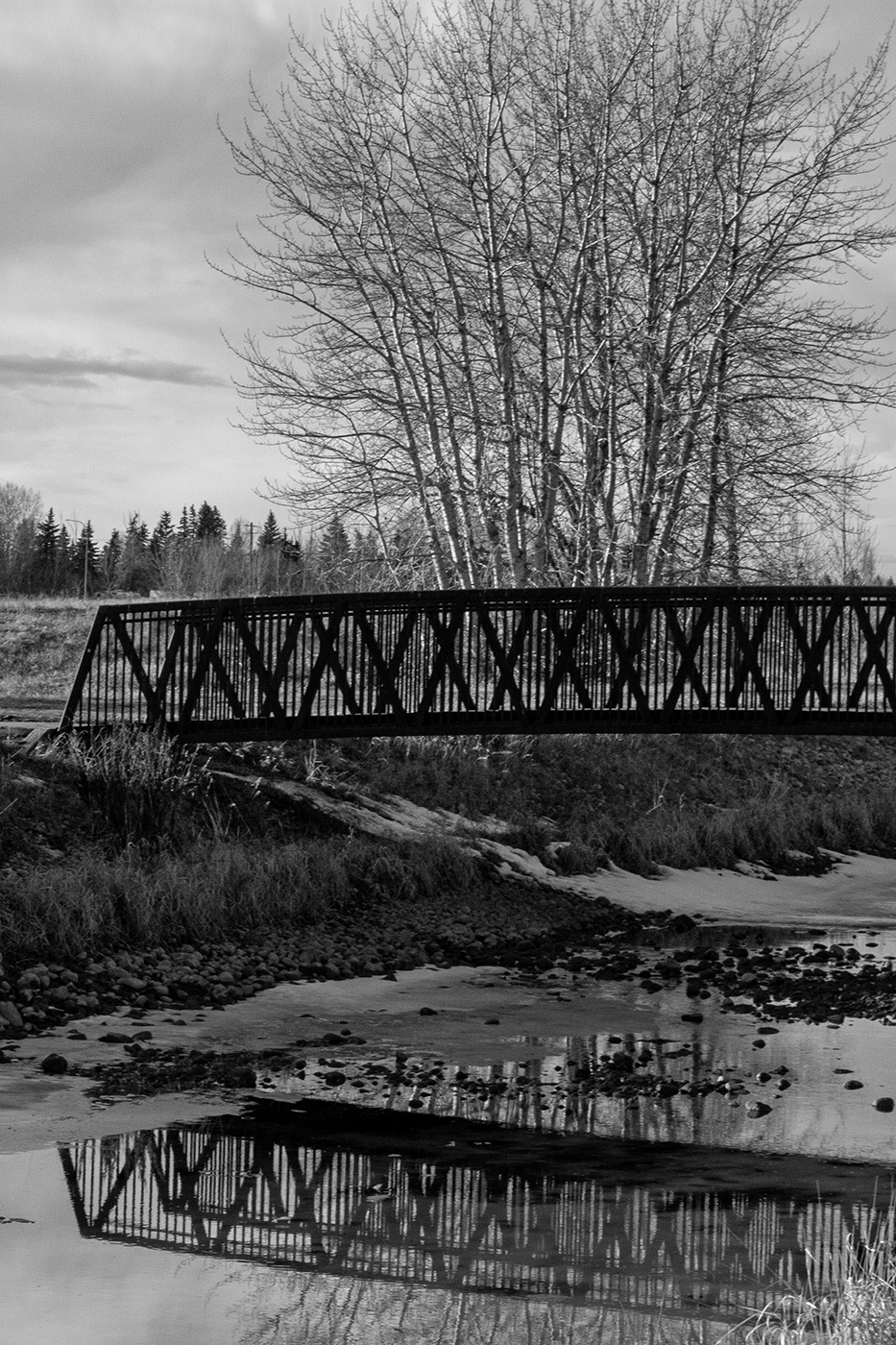 Reflected in empty canal, Tom Sadler Bridge, Strathmore, Alberta, 2024-03-12