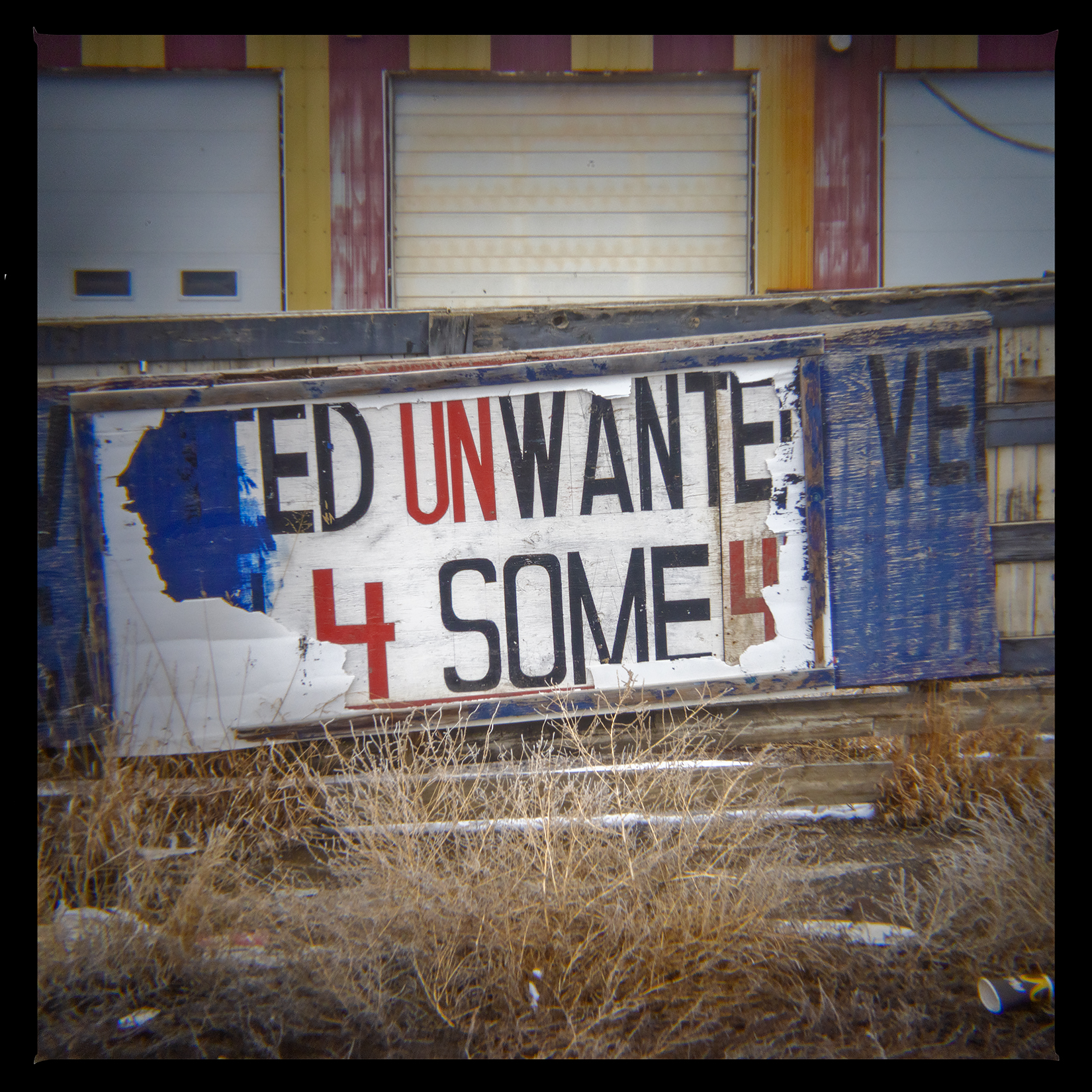 Unwanted sign at old service station, Hwy 561 and Hwy 1, AB, 2024-04-06