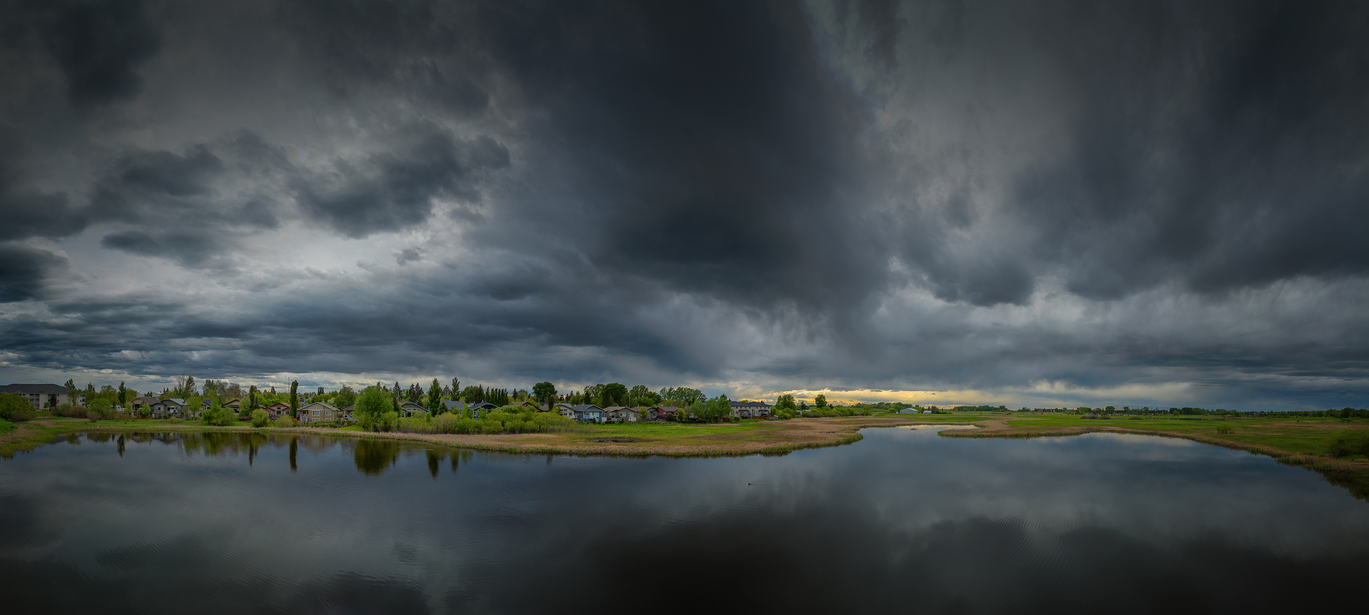 That looks like a refill on the way, Lower Gray Pond, Strathmore, AB, 2024-06-01