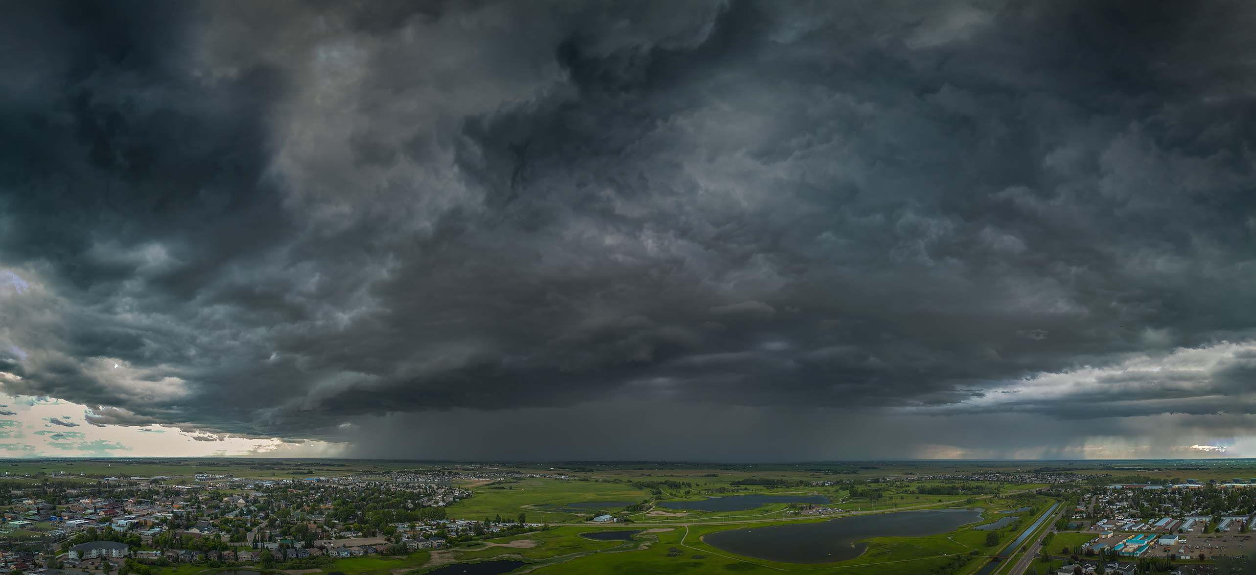 Here comes the pain again, Storm approaching from the west, Strathmore, AB, 2024-07-02