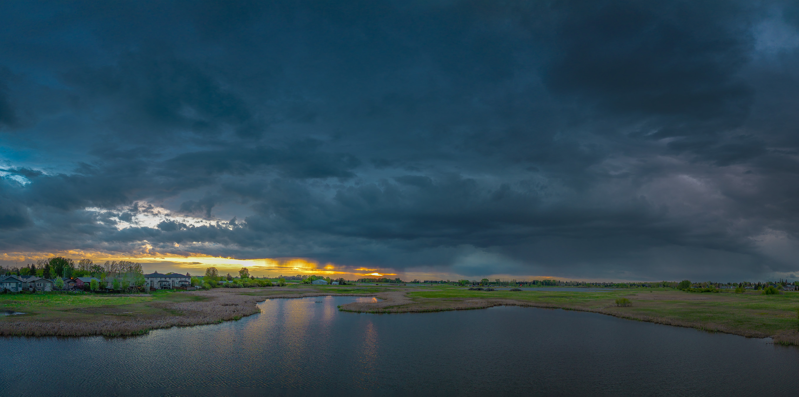 Dark skies again, Lower Gray Pond, Strathmore, AB, 2025-05-19