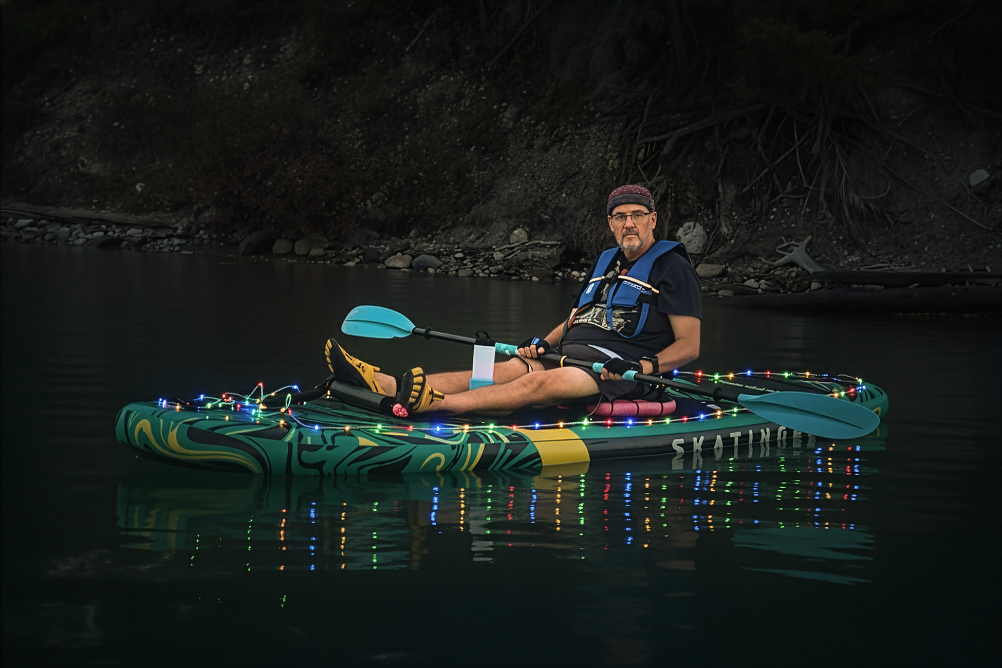 Not quite a lightbulb over his head, Light up the Night Float, Ghost Lake, Alberta, 2025-02-20