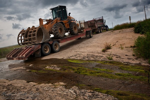 Heavy equipment crossing Sounding Creek on Old Hwy 12