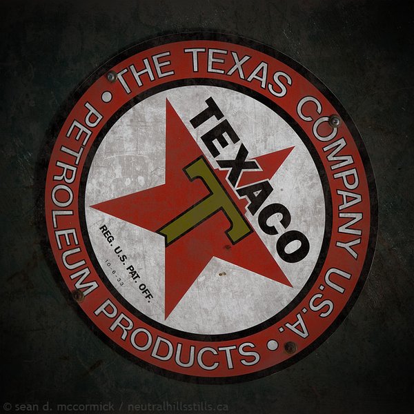 Classic Texaco logo on side of old pickup truck