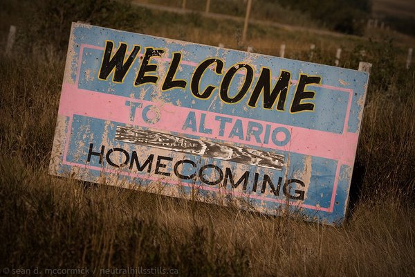 Battered sign for a tattered town