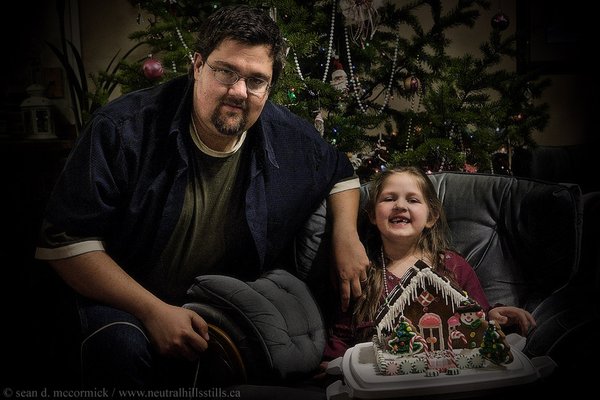 The photographer and the fruit of his lens. Er, loins.