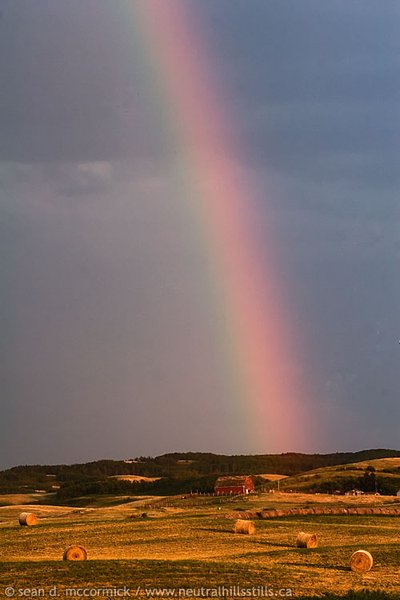 Rainbow and barn