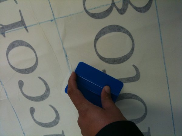 Studio Signage: Pressing the vinyl to the substrate