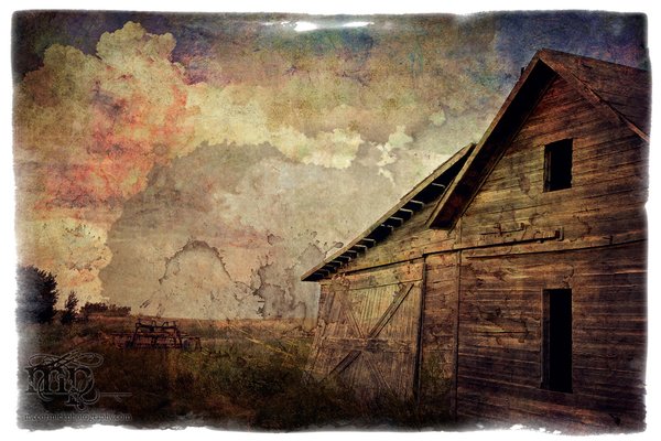 Weathered image of a weathered barn