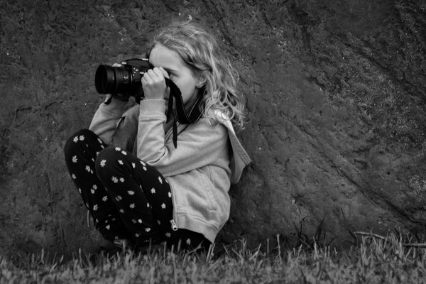 Keen Observer, Taking Photo Behind Gray Park Sign