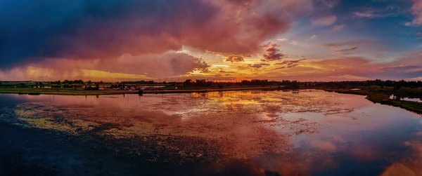 Sunset over the large pond, Gray Park, Strathmore, AB, 2022-07-30