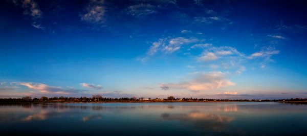 Looking East into the Alpenglow, Gray Pond at Dusk, Strathmore, Alberta. 2023-05-10