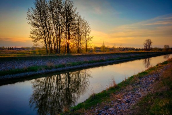 Perfunctory Sunset Reflection Shot, Irrigation Canal Along Thomas Drive, Strathmore, Alberta. 2023-05-10
