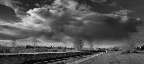First rain clouds of 2024, Tom Sadler Bridge, Strathmore, Alberta, 2024-03-12