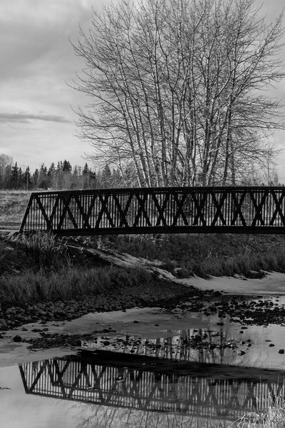 Reflected in empty canal, Tom Sadler Bridge, Strathmore, Alberta, 2024-03-12