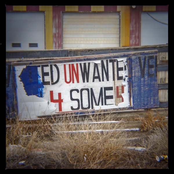 Unwanted sign at old service station, Hwy 561 and Hwy 1, AB, 2024-04-06