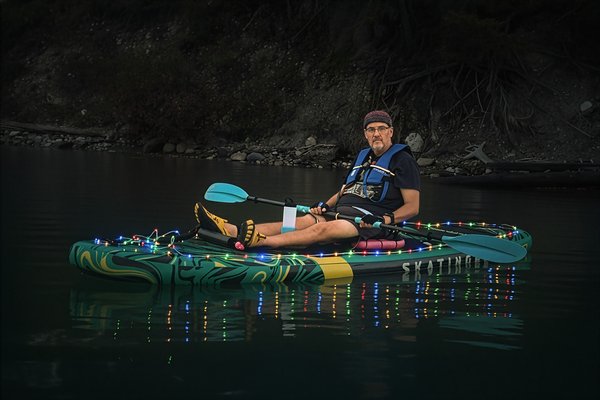 Not quite a lightbulb over his head, Light up the Night Float, Ghost Lake, Alberta, 2025-02-20