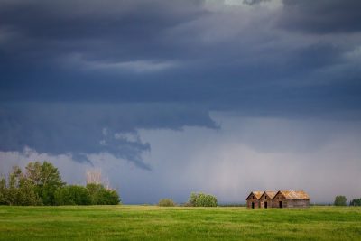 Sheds about to get washed, East of Strathmore, AB, 2026-06-20