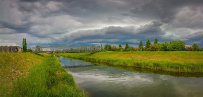 Wallking bridge, Lion's Park with incoming storm, Strathmore, AB, 2026-06-20